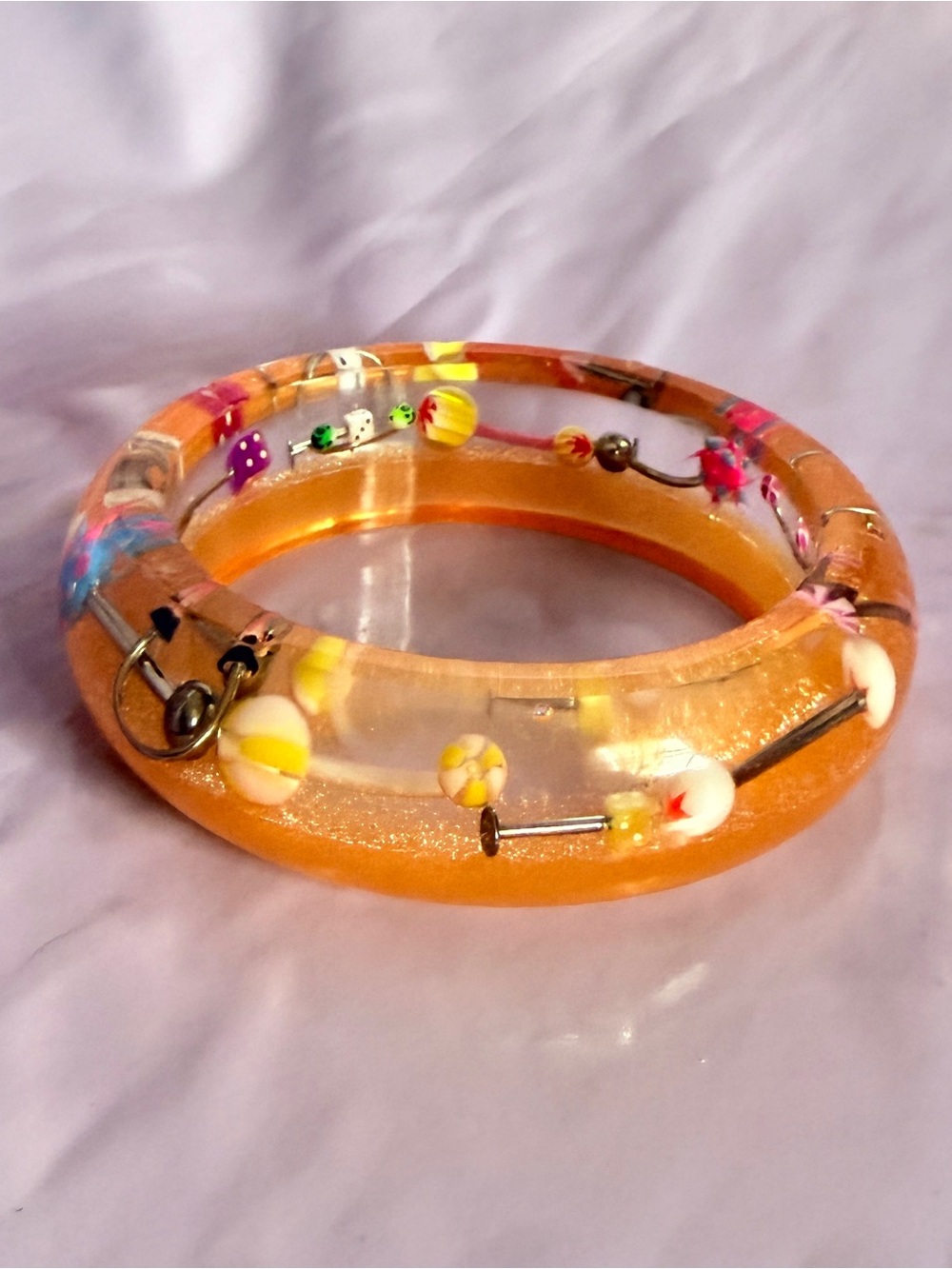 Orange piercing bangle - Picture 3 of 3